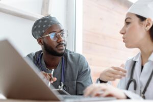 healthcare workers conferring