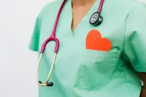 doctor with heart pin