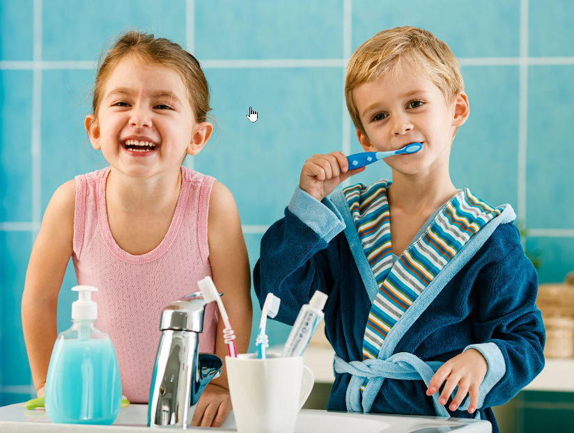 kids brushing teeth and smiling