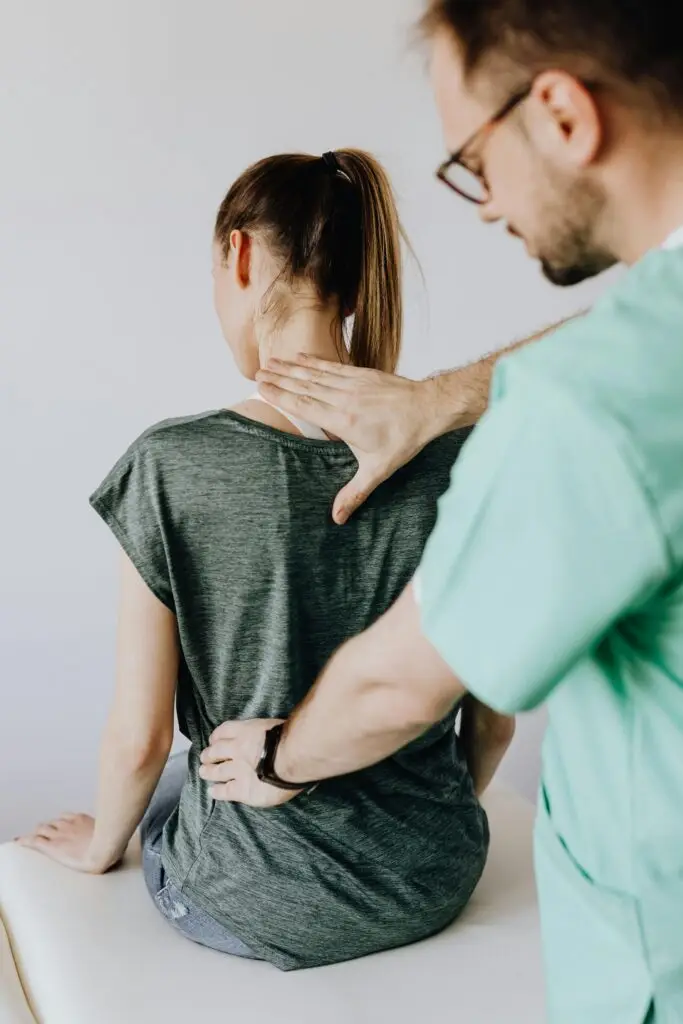 osteopathic doctor performing physical manipulation