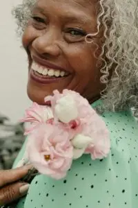 healthy aging with smile and flower